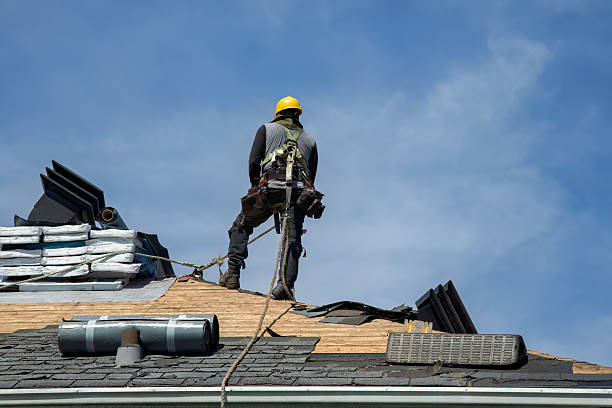 Professional Roofing technician working in Beach City, TX